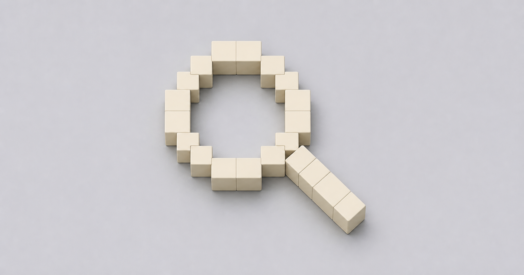 A magnifying glass made of cream blocks, representing inspection of enterprise decision logic