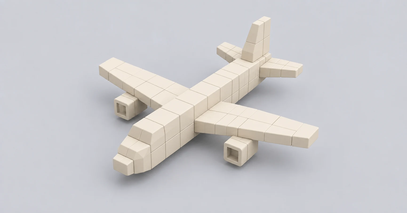 Airplane constructed from cream-colored blocks on a light gray background